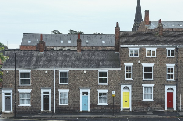 Terraced houses with different coloured doors