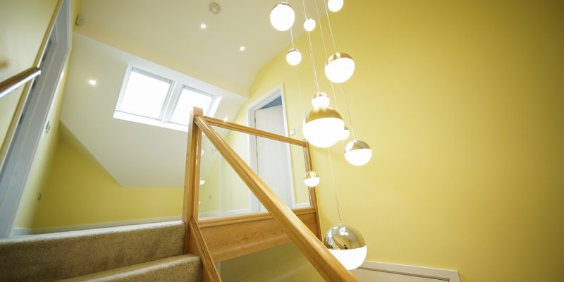 lights in a stairwell of an adapted home